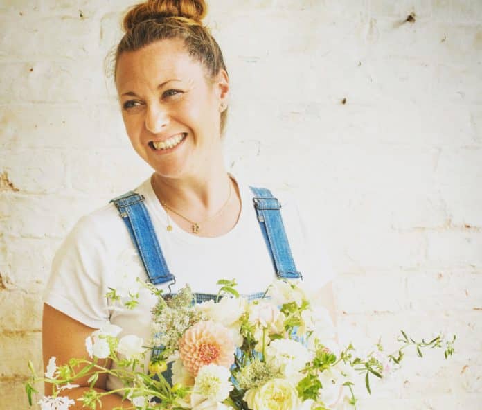 Beth-Childs-with-some-of-her-flowers-696x592